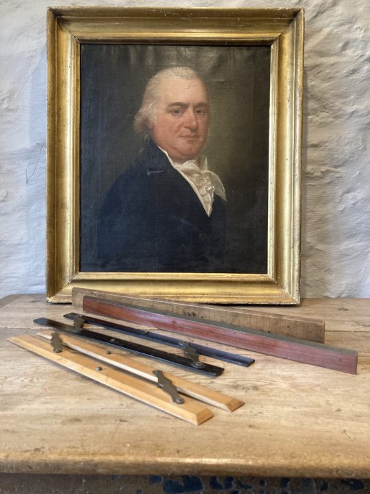 A collection of four rulers
