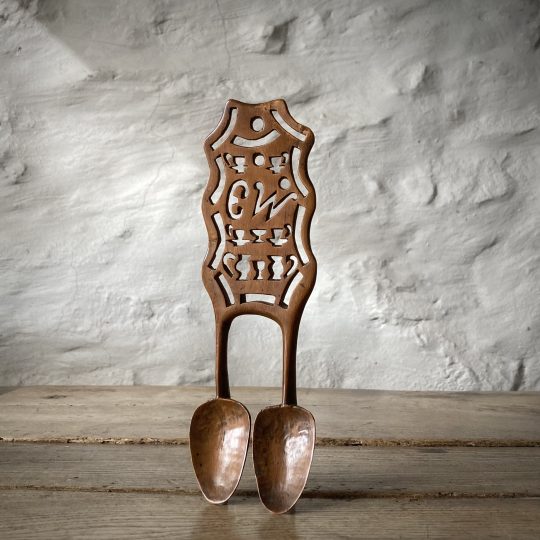 A Welsh sycamore double lovespoon which is shown in a rare original photo.