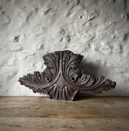 A fragment of 18th century oak carving