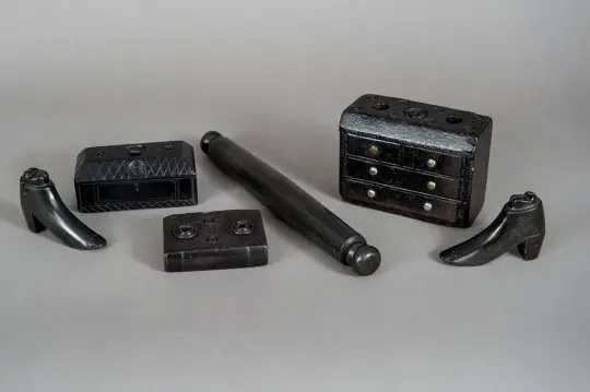 A collection of slate folk art