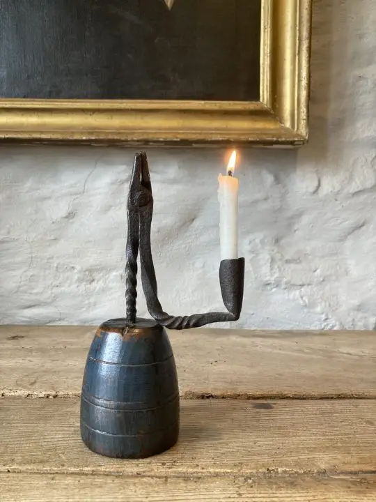19th century rushlight holder in a painted base Sold