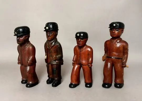Collection of carved Welsh folk art miners Sold